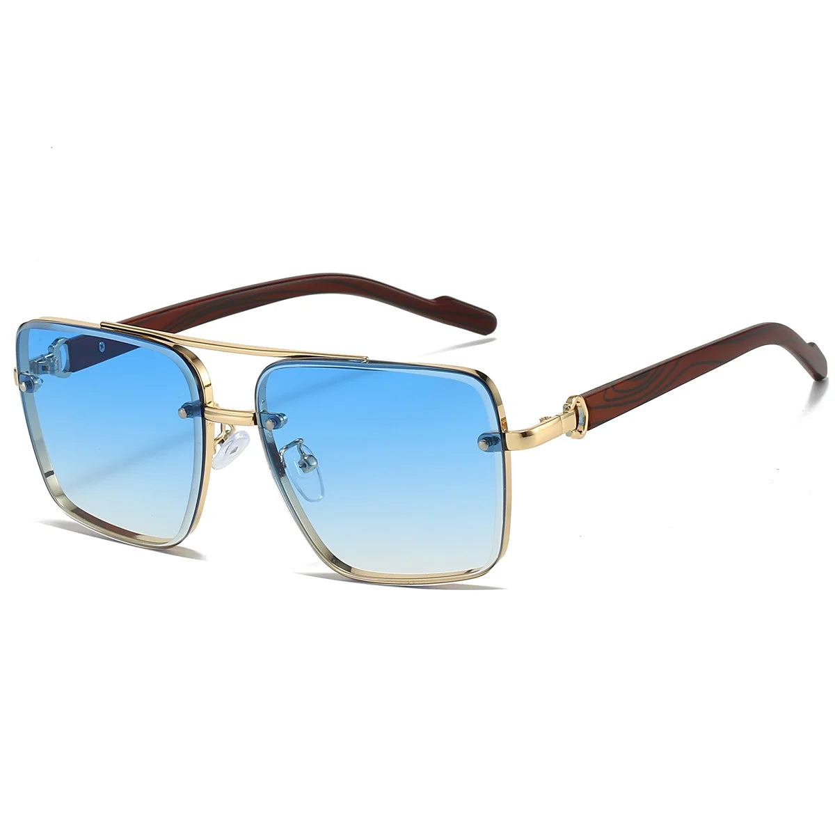 Sunglasses with blue gradient lenses and gold frame on a white background