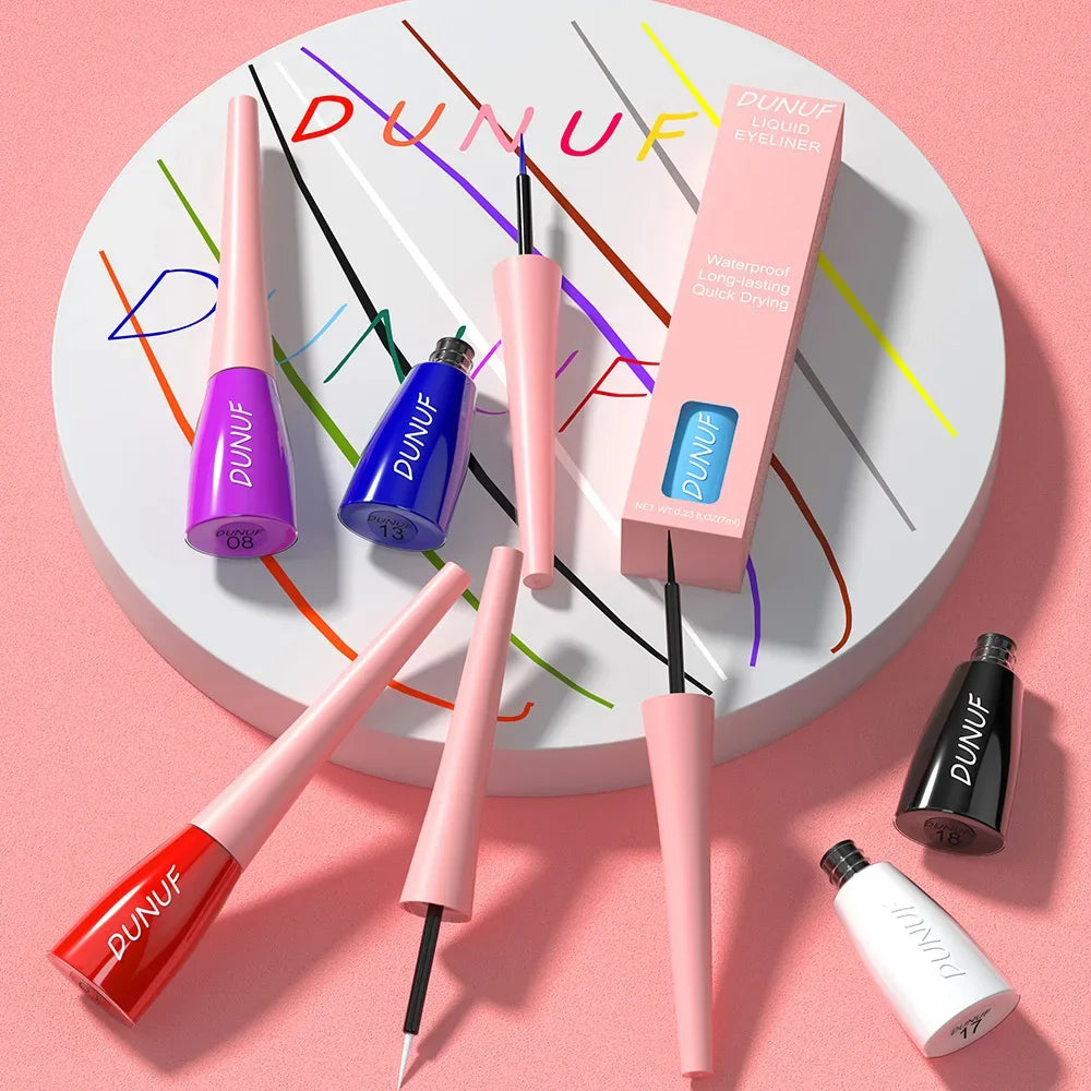 DUNUF eyeliner products on a white plate with colorful lines on a pink background