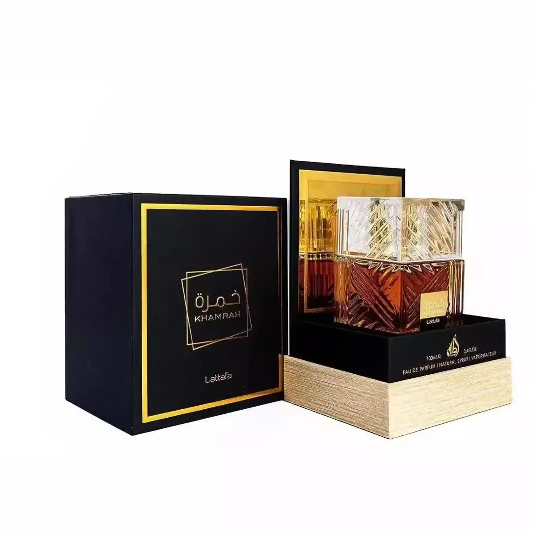 Perfume bottle with black box featuring 'Khamrah' branding on a white background