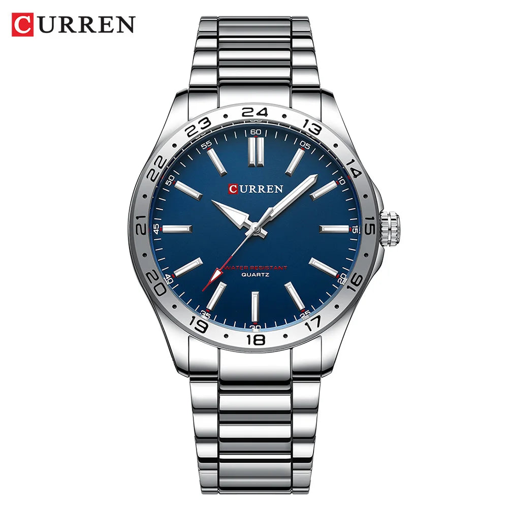 Curren watch with blue dial and silver metal strap on a white background