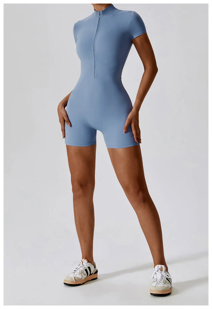Person wearing a blue bodysuit on a white background