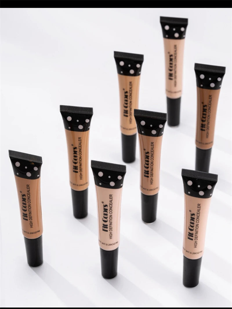 Multiple tubes of 'Italia' high-definition concealer on a white background
