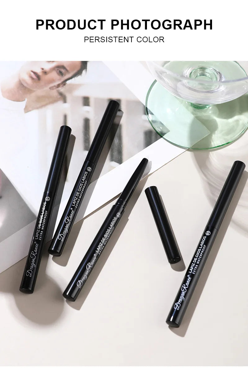 Black eyeliner pencils on a white surface with a blurred background