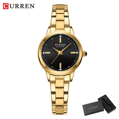 Gold wristwatch with black dial on a white background, featuring the brand 'Curren'.