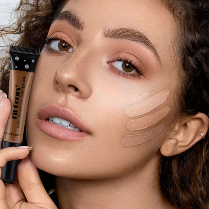 Woman applying foundation with a makeup product on her face