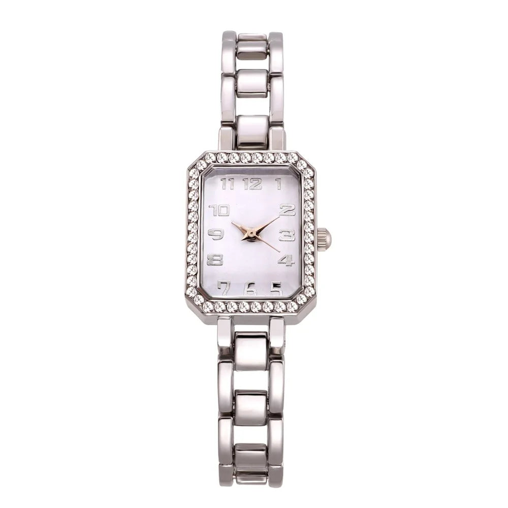 Silver watch with a rectangular face on a white background
