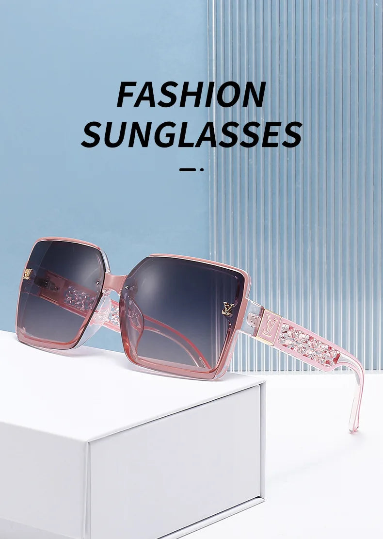 Fashion sunglasses with pink frame and dark lenses on a white surface with blue background