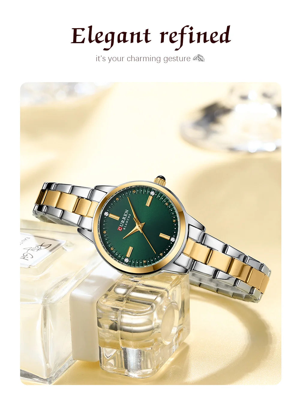 Elegant watch with gold and silver band on a white background