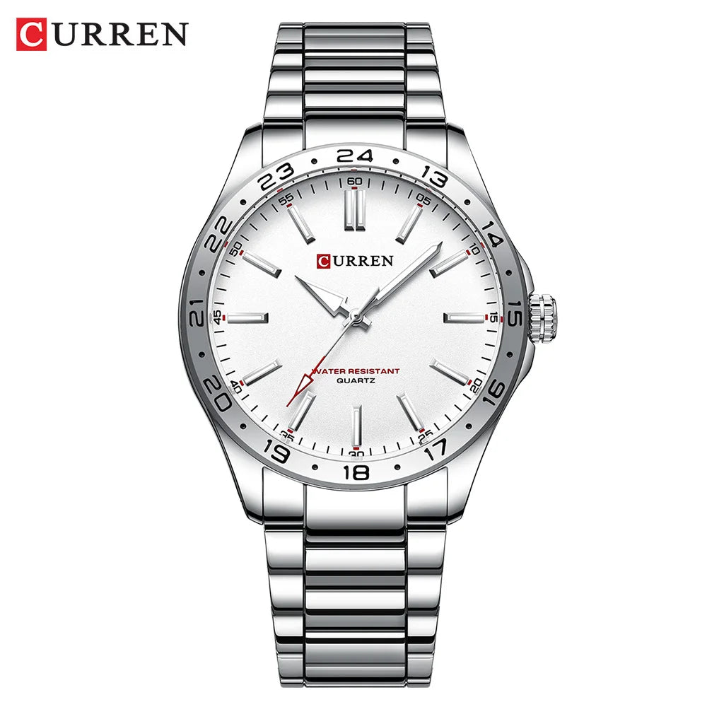 Silver Curren watch with white face on a white background
