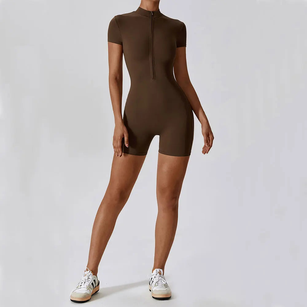 Brown bodysuit worn by a model on a white background