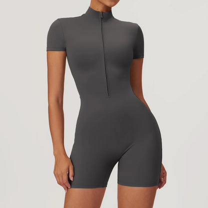 Gray bodysuit with a front zipper on a plain background