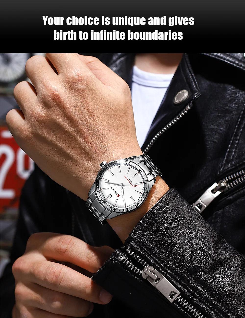 Person wearing a silver watch on a black leather jacket with text above.