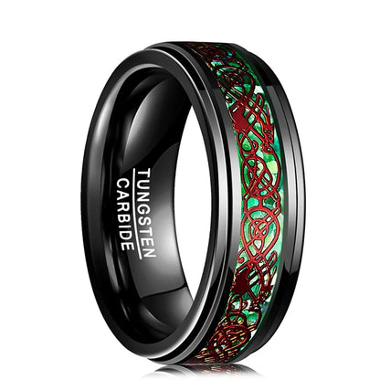 Black tungsten carbide ring with red and green Celtic knot design on a white background