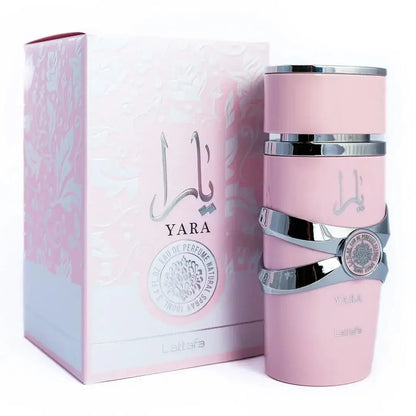 Pink Yara perfume bottle with packaging on a white background