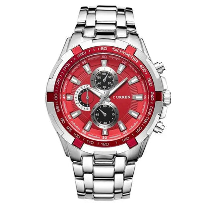 Wristwatch with red face and silver metal strap on white background