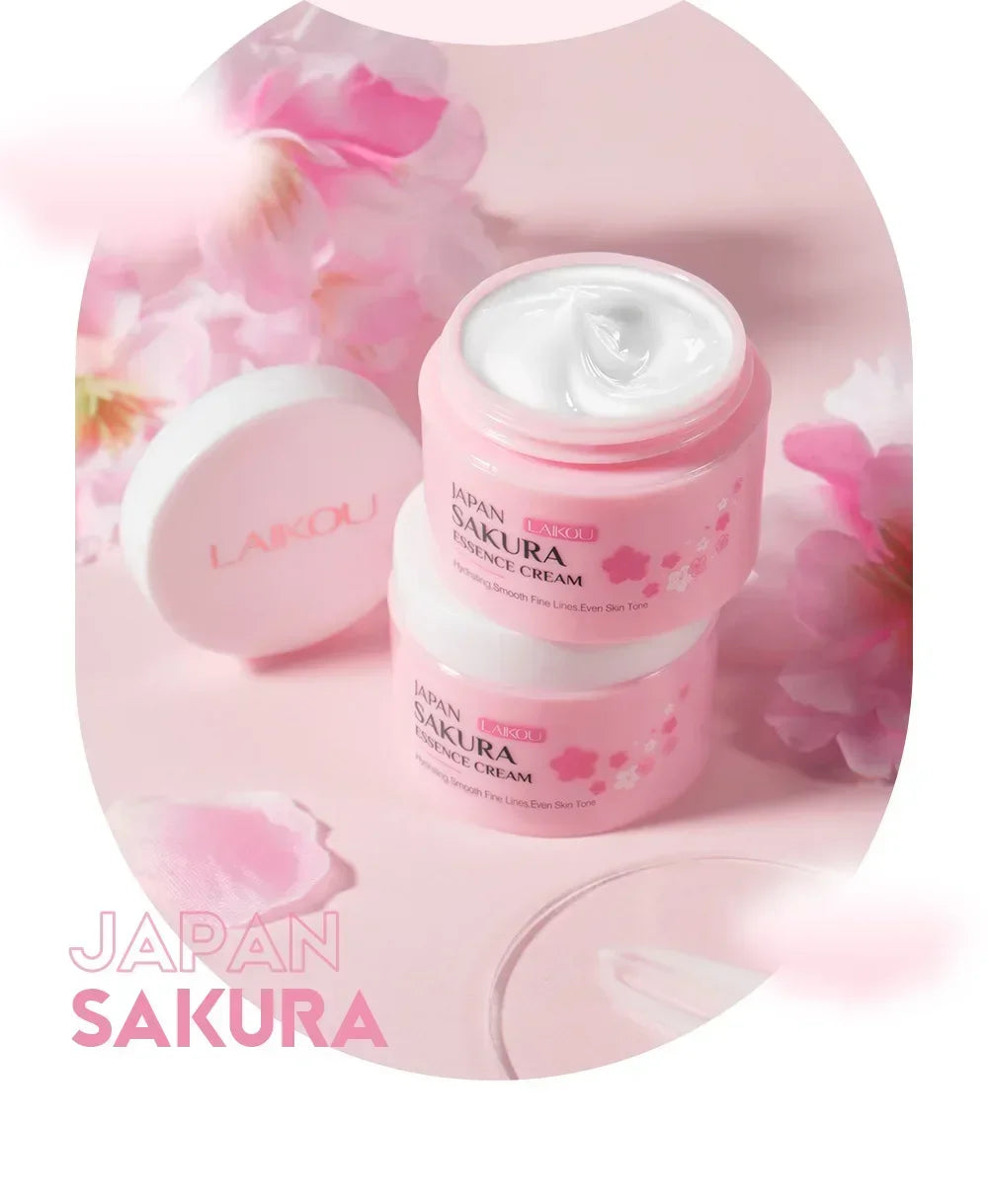 Pink skincare product with cherry blossoms and 'Japan Sakura' text on a pink background